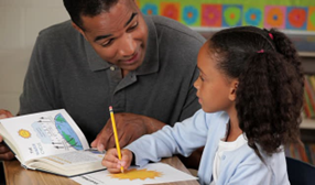 man and girl doing school work